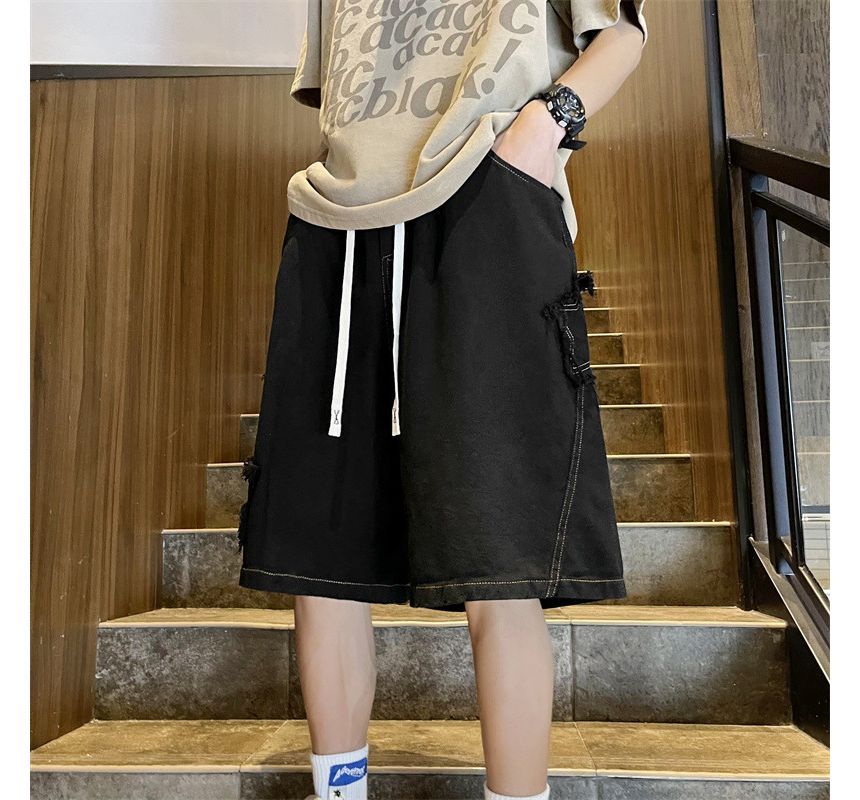 Hushgrain - Lage denim shorts met contrasterende stiksels