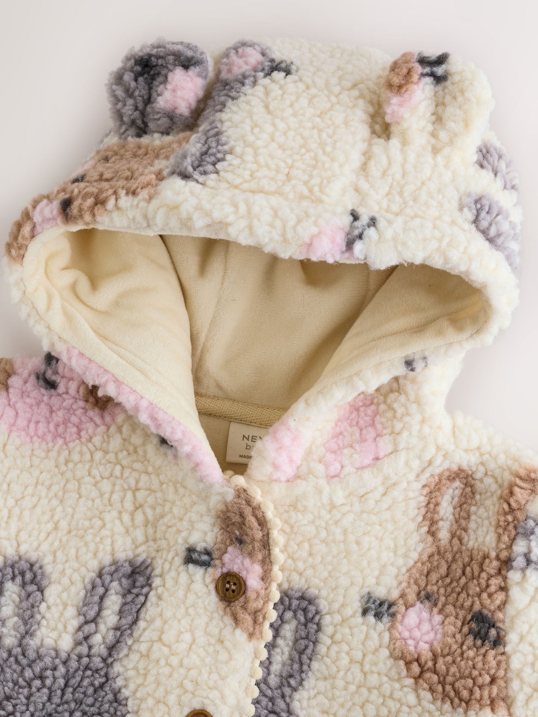 Ecru en roze konijnenprint - Borg babyjack met capuchon (0mnd-2jr)