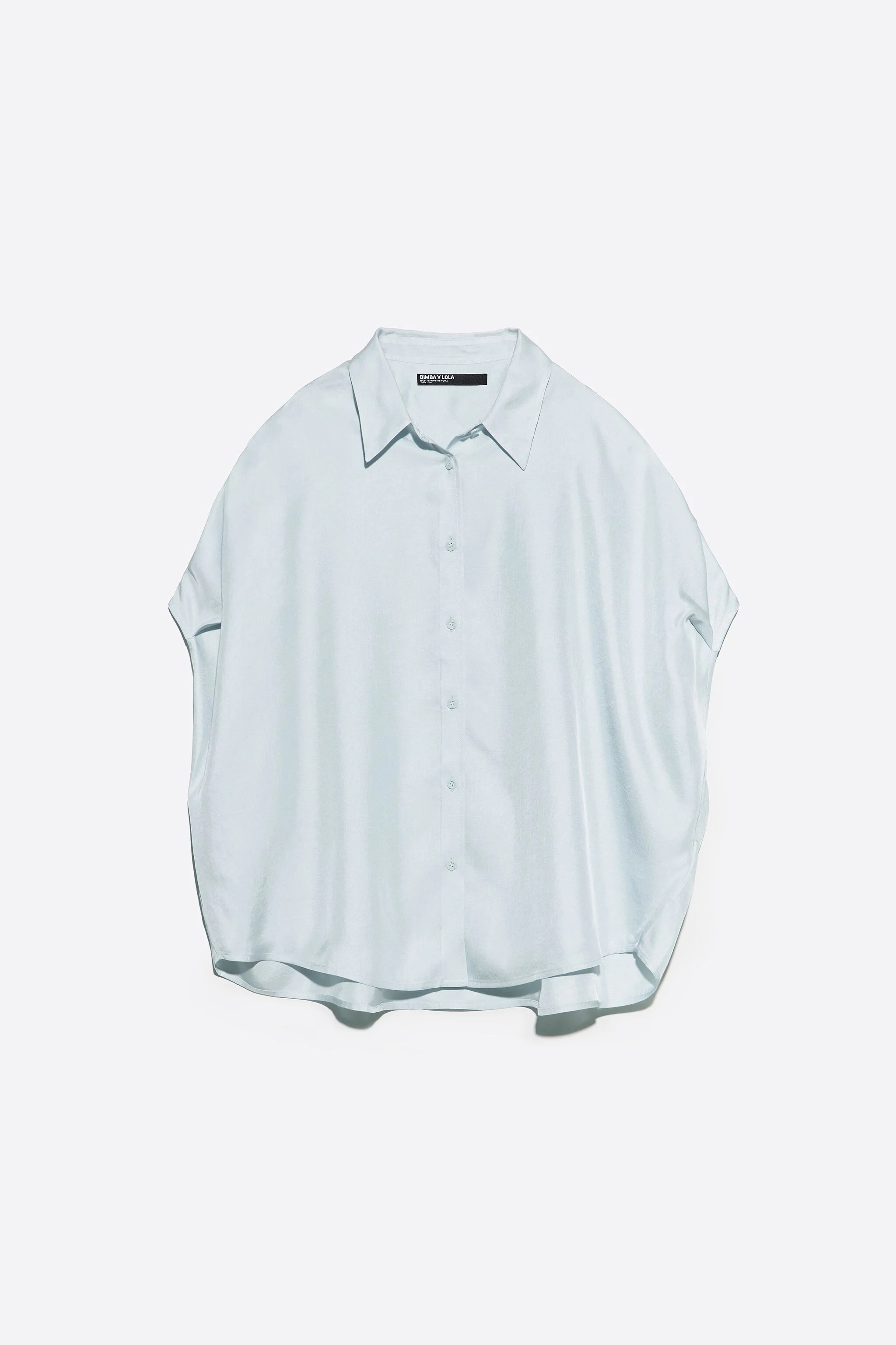 camisa capa fluida azul claro