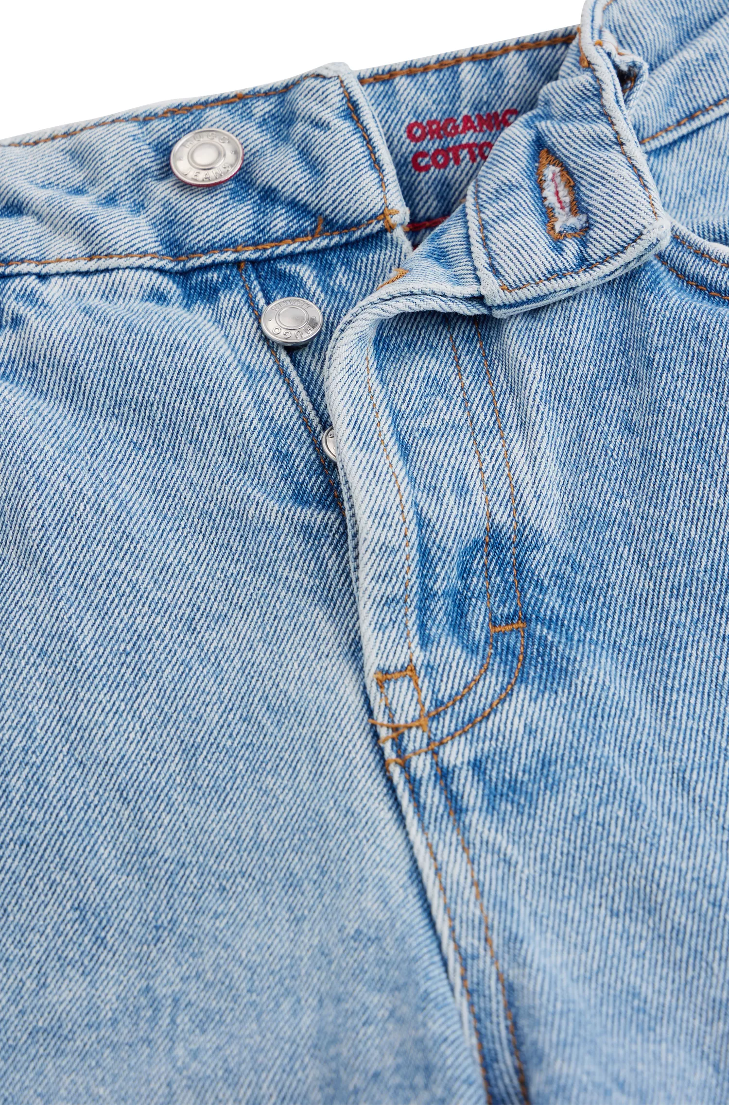 Calça jeans HUGO vermelha, de corte moderno e pernas largas, em denim de algodão orgânico azul.