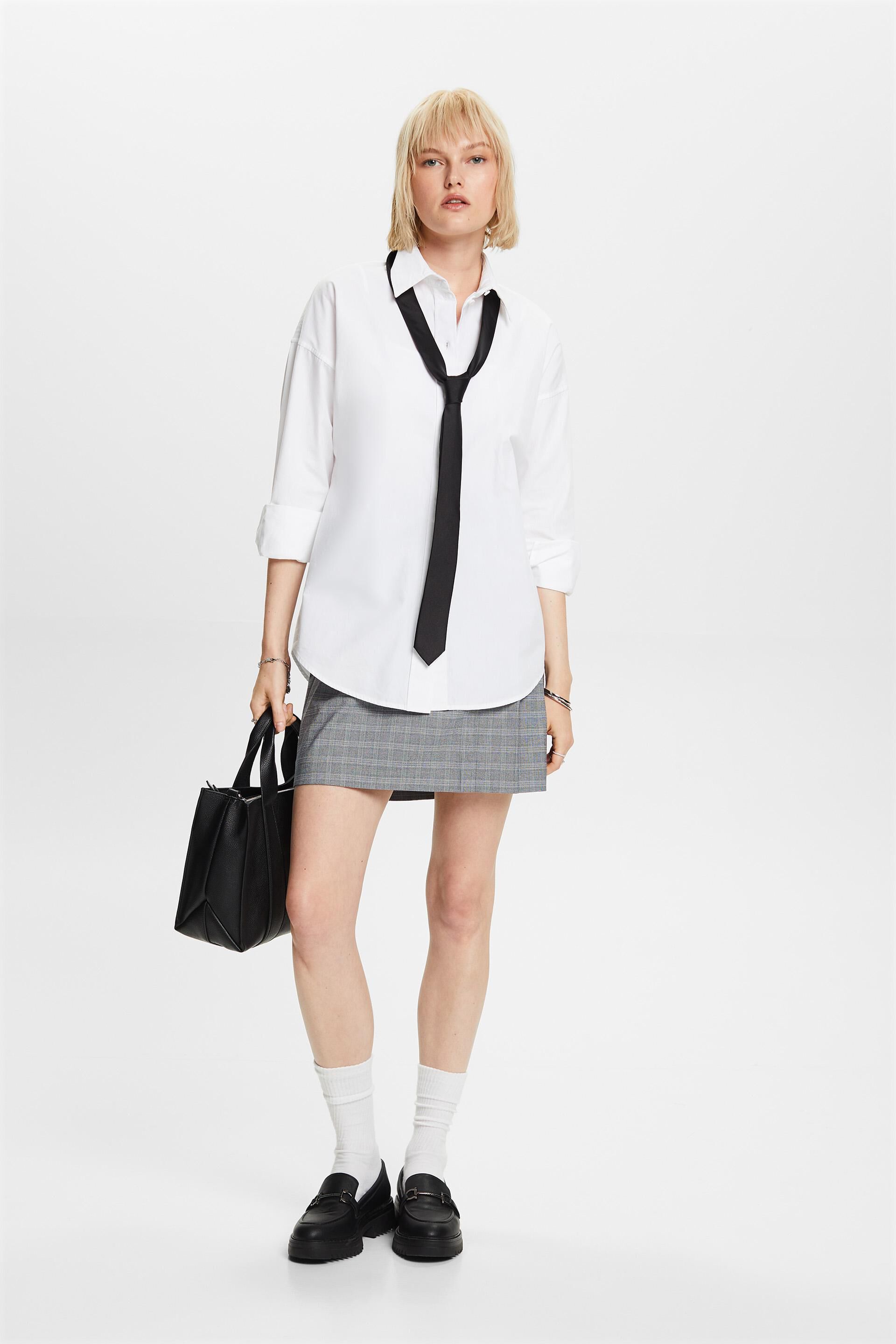 Tendance mix & match : mini-jupe plissée à carreaux