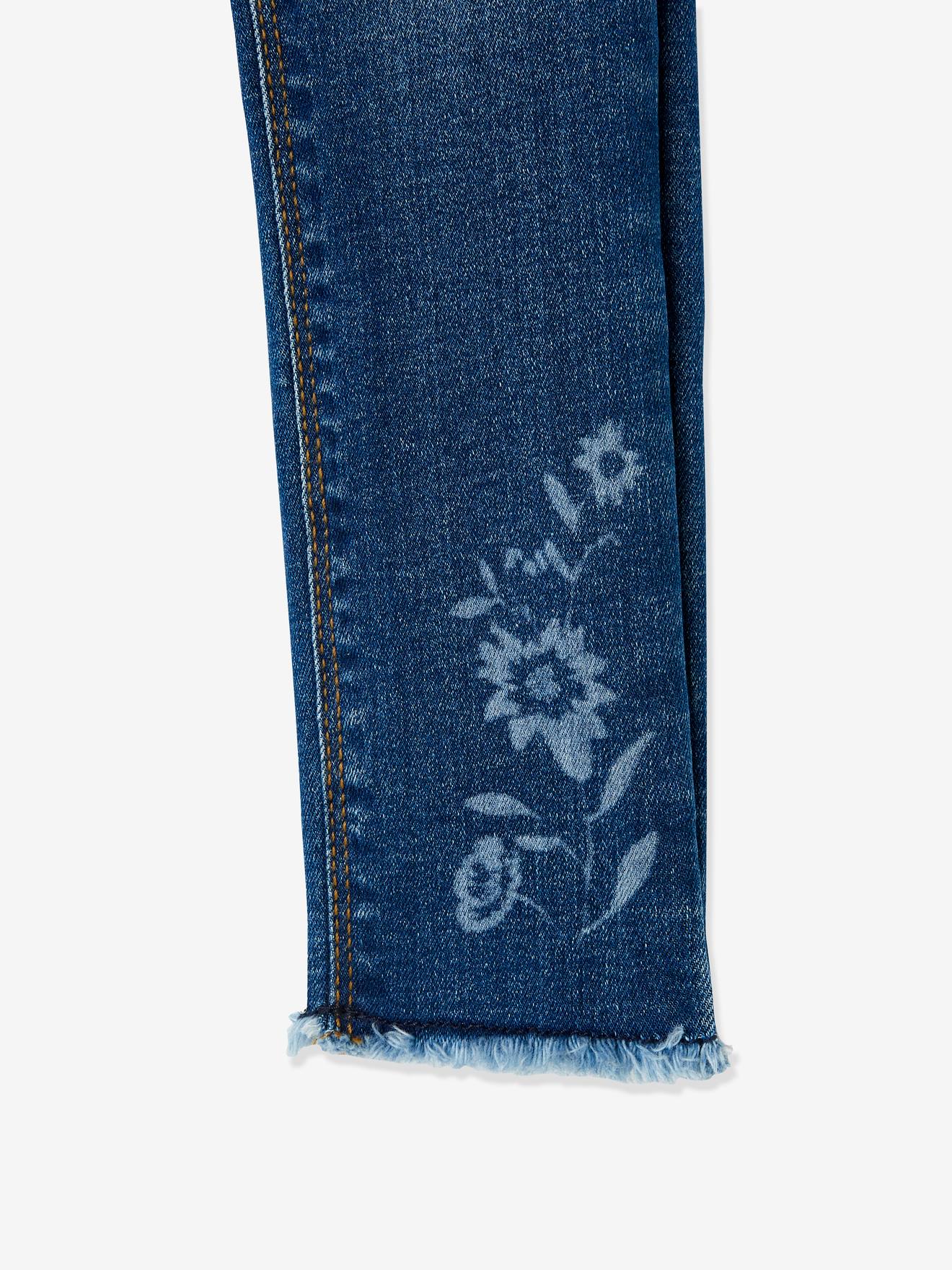 Calça legging infantil com estampa a laser, na cor azul médio lisa com detalhes.