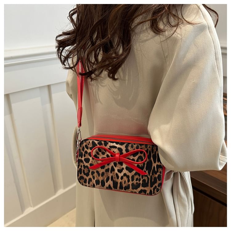 Indenis - Crossbodytas met luipaardprint en strik