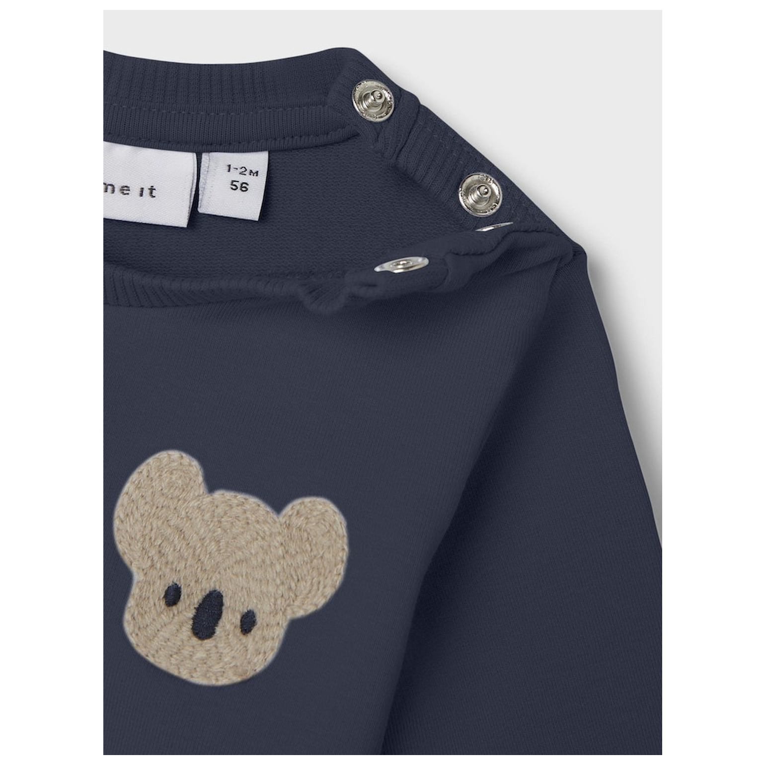 name it NBMBANUS LS SWEAT UNB