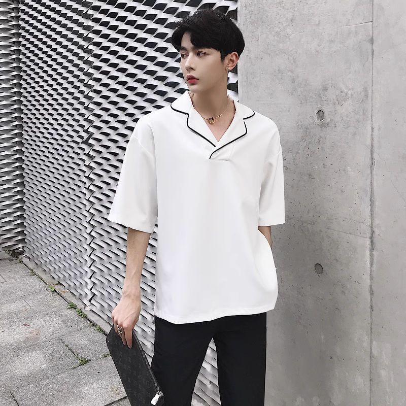 Bjorn - T-shirt met 3/4-mouwen, reverskraag en contrasterende bies en split