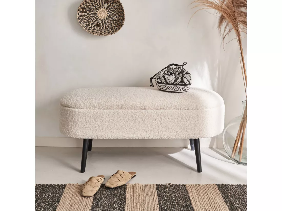 Banc coffre. bout de lit avec revêtement bouclette. écru. pieds en bois noir. L 112 x 44 x 50cm