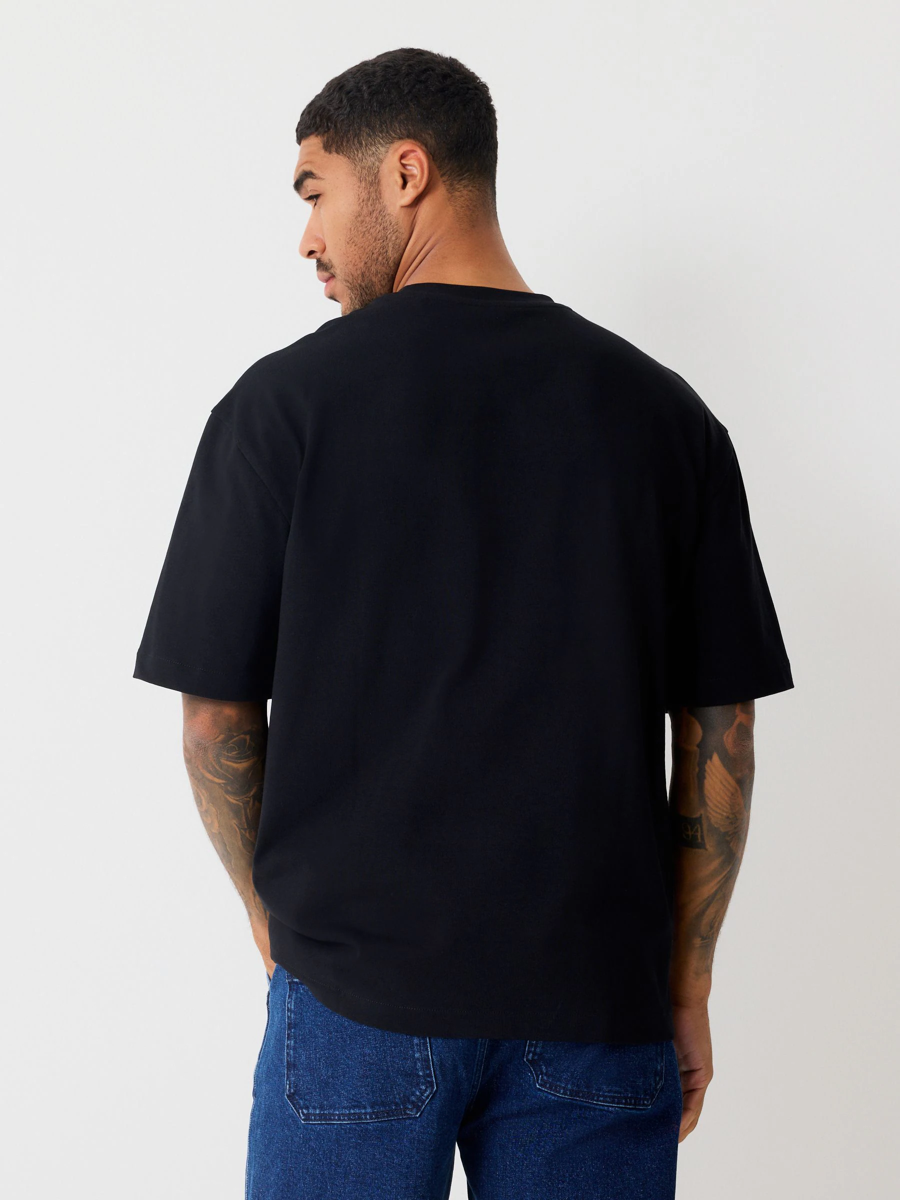 Zwart met tekst - Relaxed fit - Kerst T-shirt
