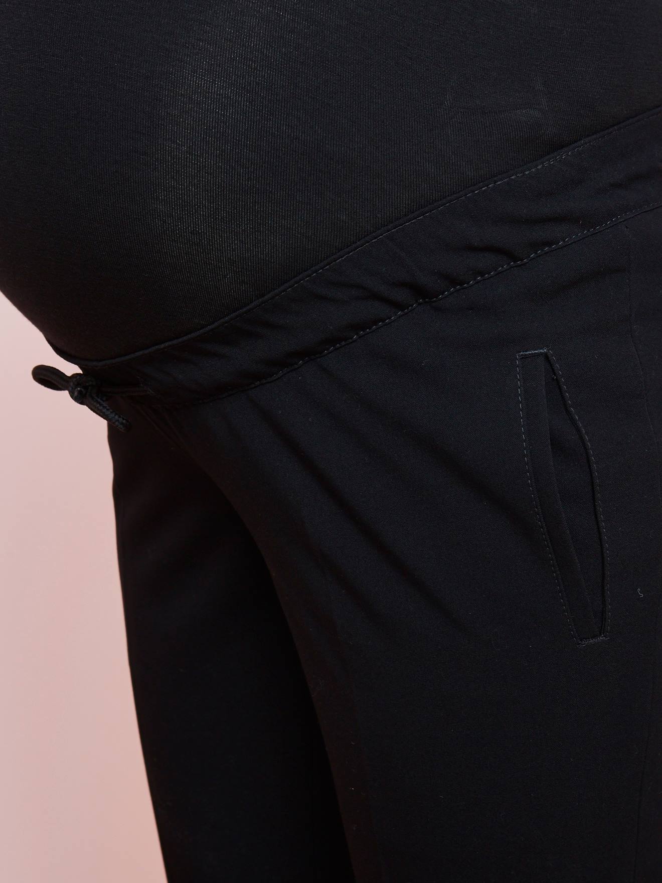 Calças skinny pretas lisas para gestantes