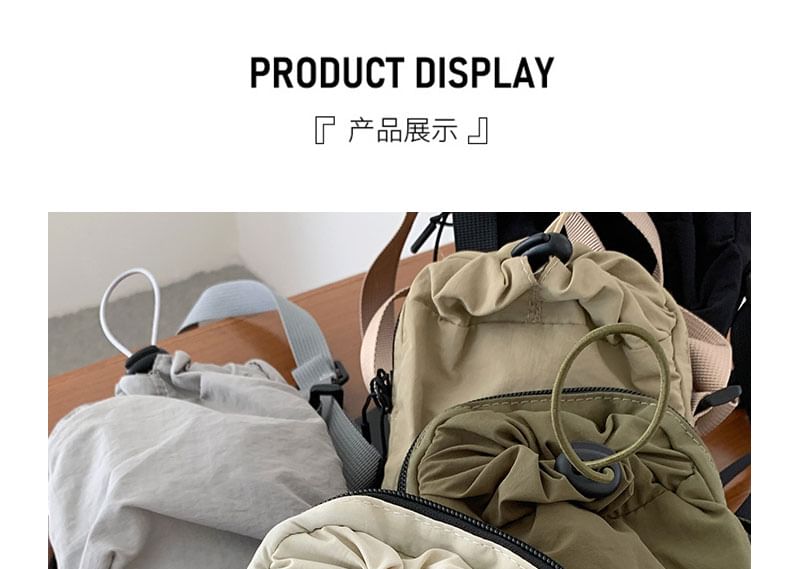 Bolso - Effen nylon crossbodytas met trekkoord