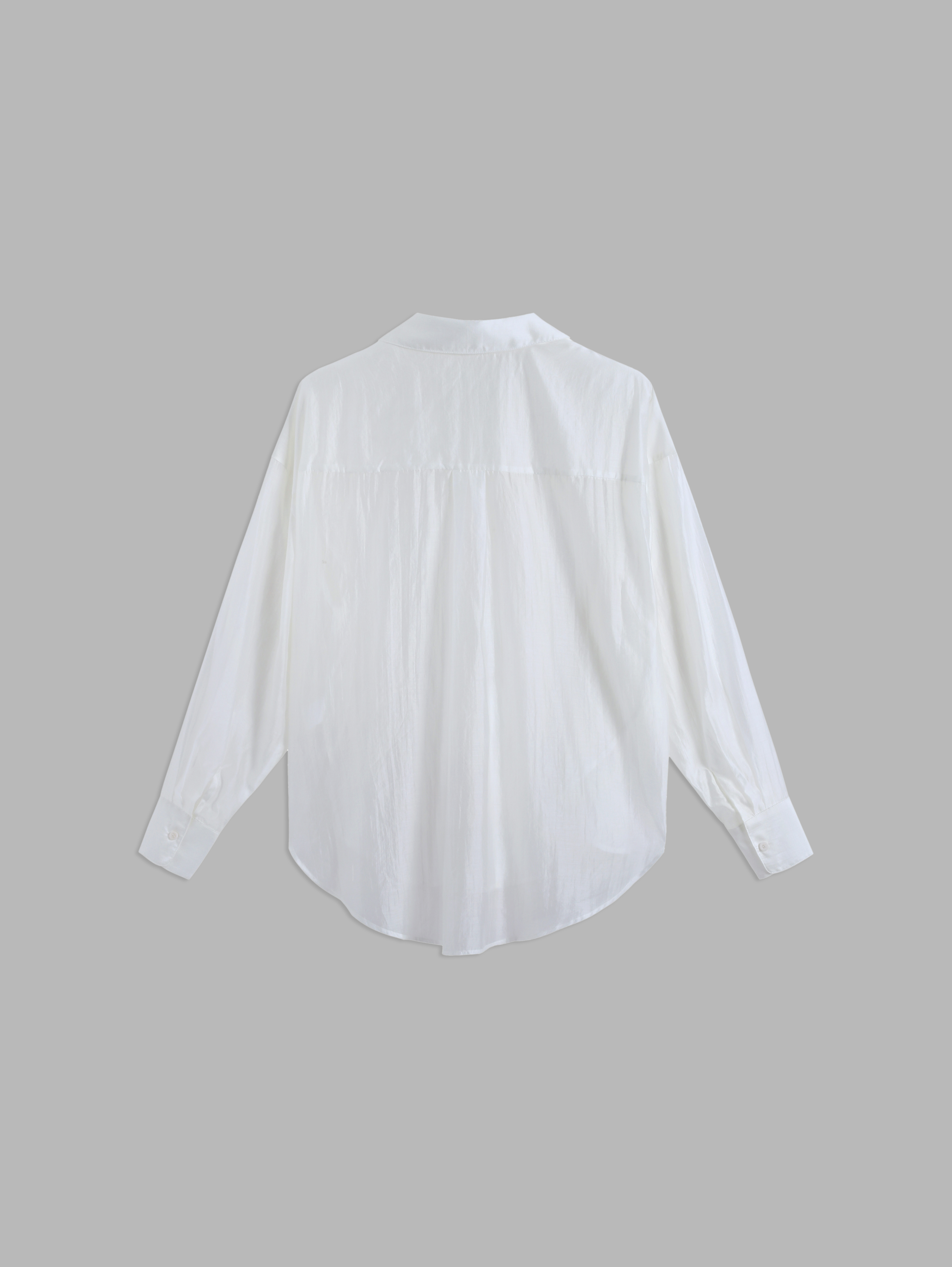 Chemise à manches longues et boutons blanche