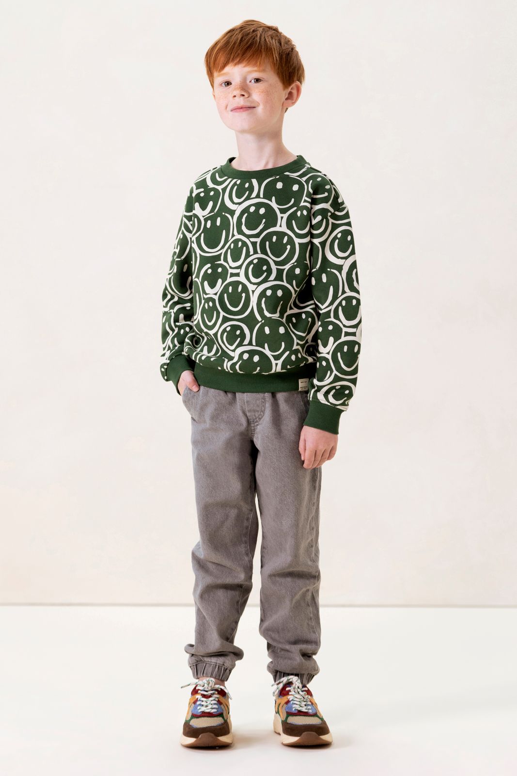 Groene sweater met smiley print