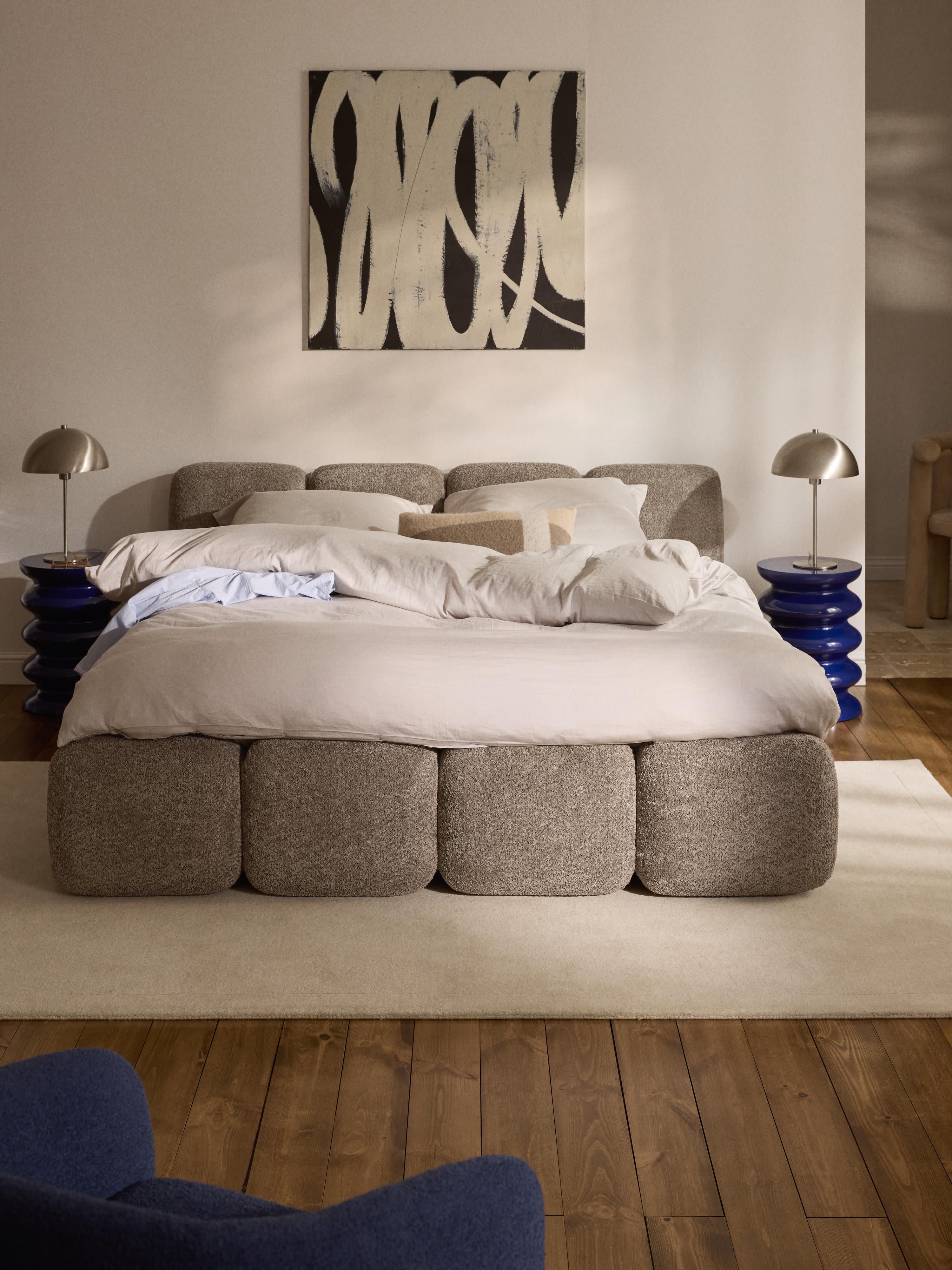 Gestoffeerd bed Tayla van teddy bouclé met opbergruimte