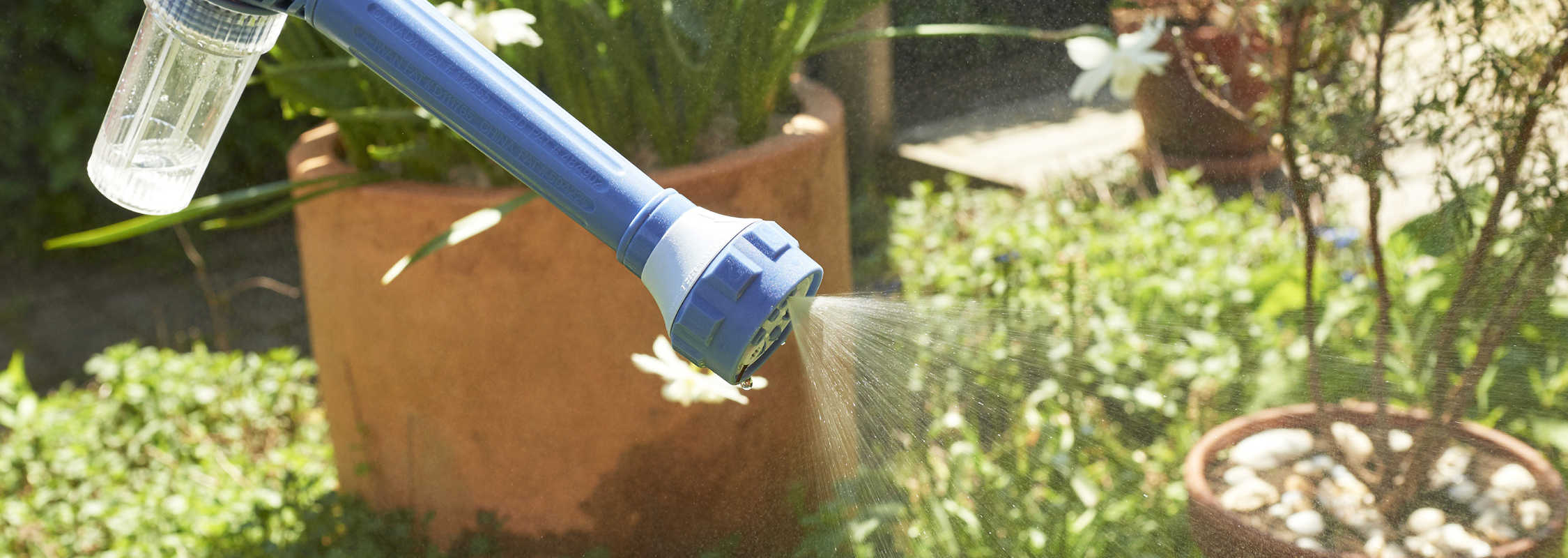 Sprøytepistol med dispenser
