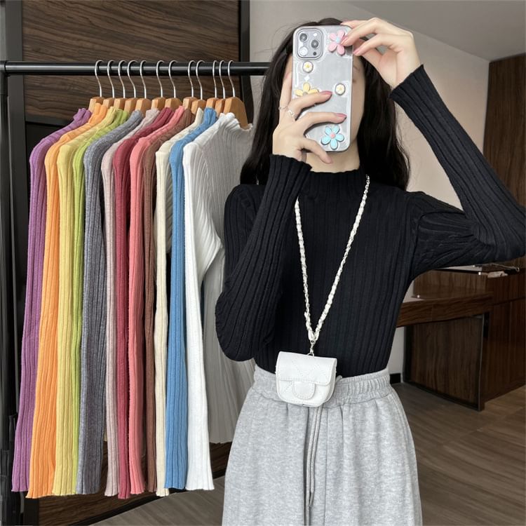 LINSI - Effen gebreide top met lange mouwen en mockneck