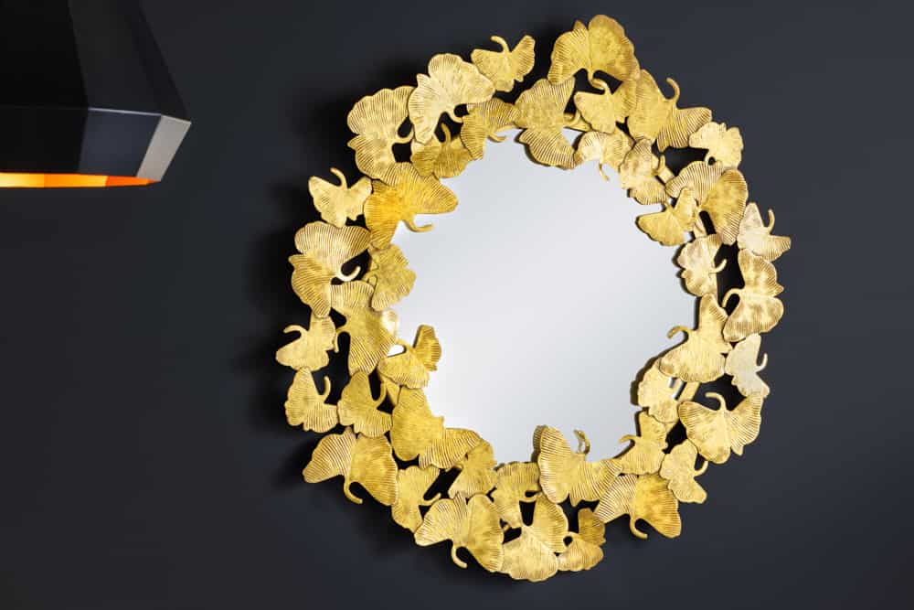 Dekorativer Wandspiegel GINKGO LEAFS L 70cm gold rund aus Metall handmade