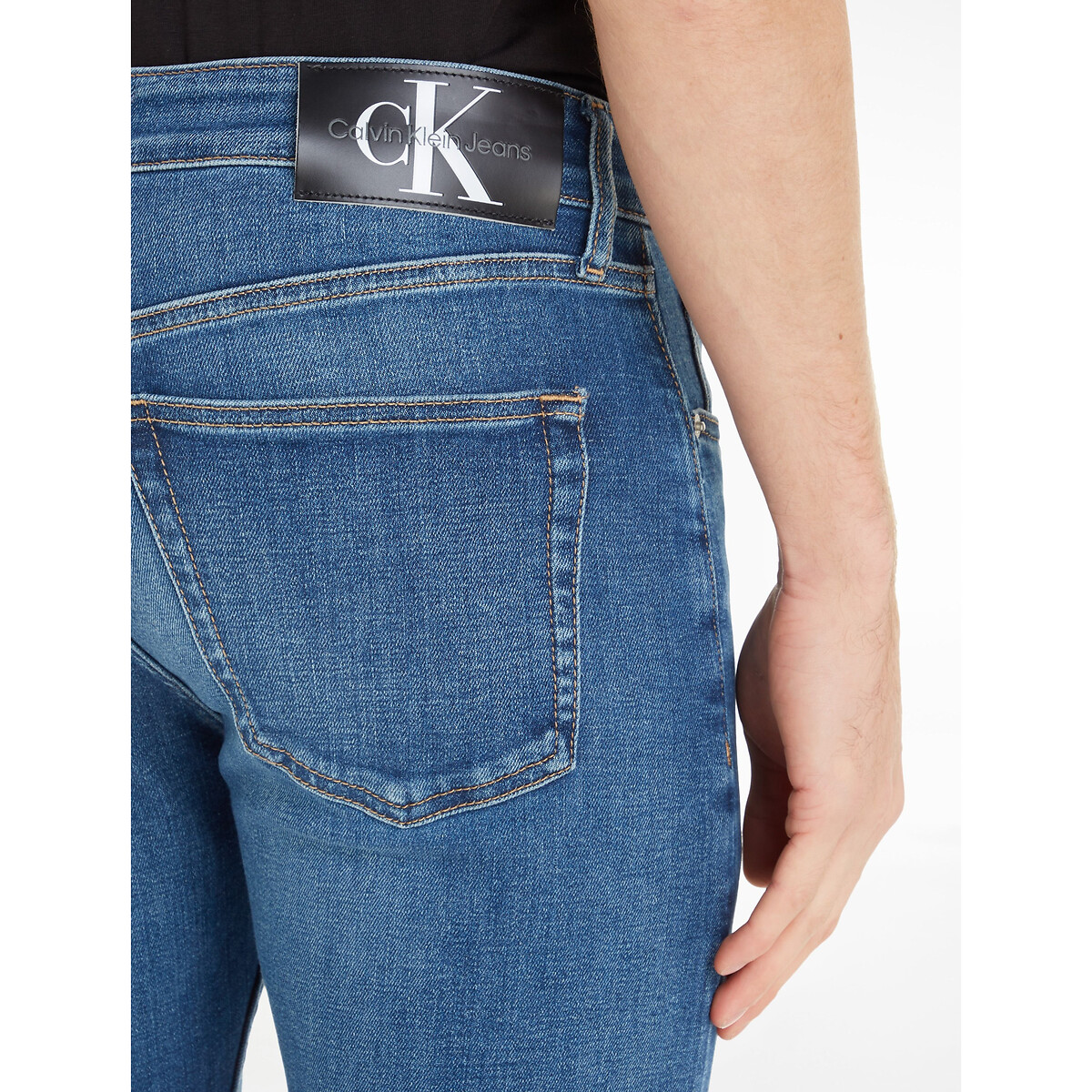 CALVIN KLEIN JEANS<br>Calça jeans slim tapered