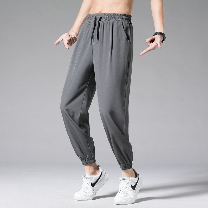 Acrius - Effen cropped harembroek met trekkoordtaille