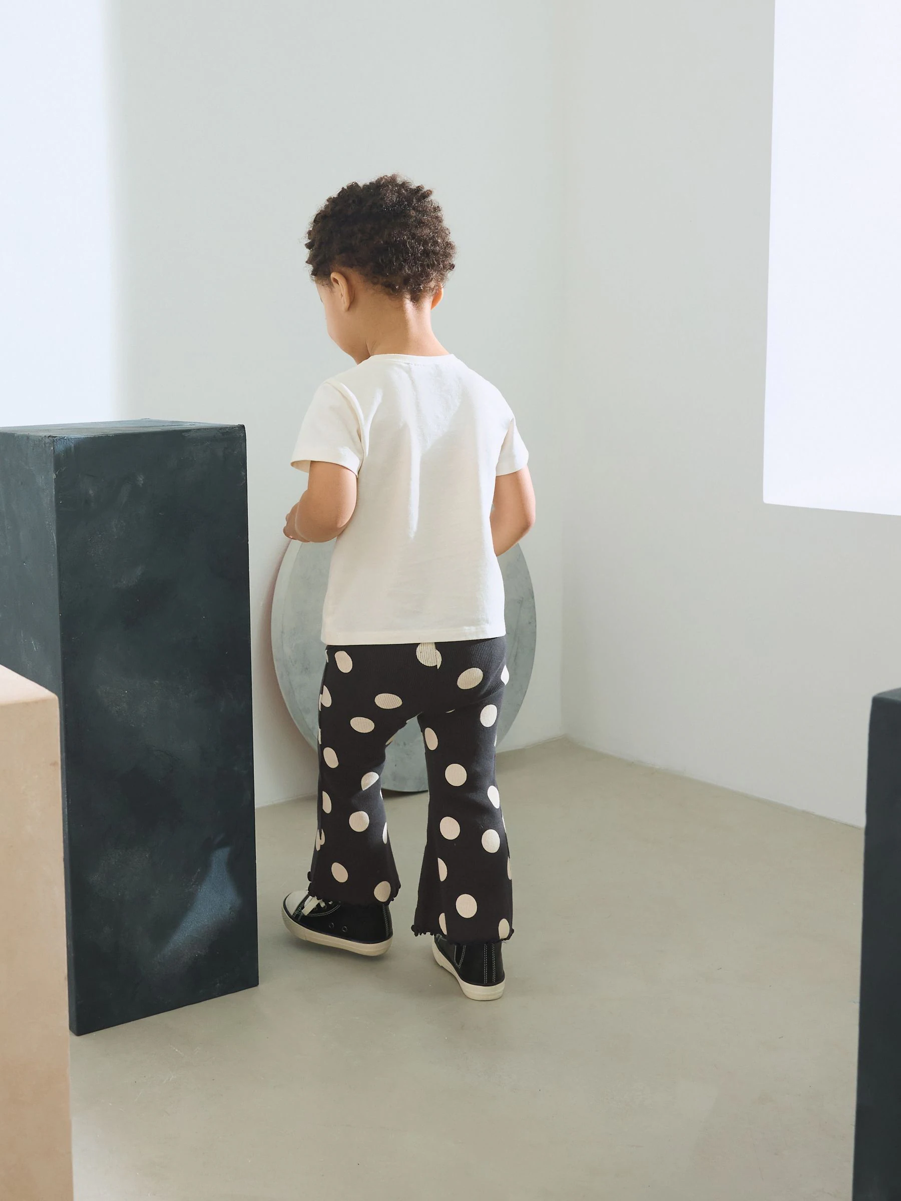 Zwart-wit gestippeld - Geribbelde flare legging (3 mnd-7 jr)