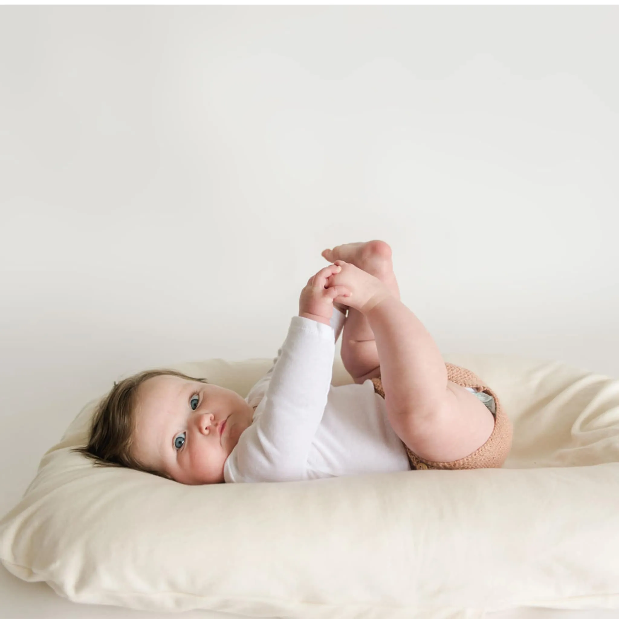 Snuggle me Housse pour Coussin Snuggle Me - Naturel