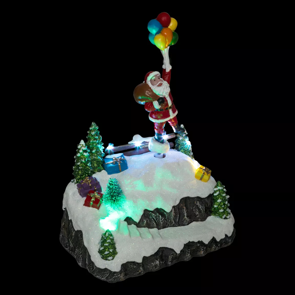 Scène de vie illuminée et animée (H22 cm) Envol du Père Noël