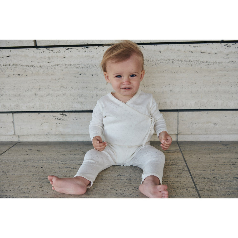 Køb COPENHAGEN COLORS Cream Pointelle Heart Crossover Body Ls