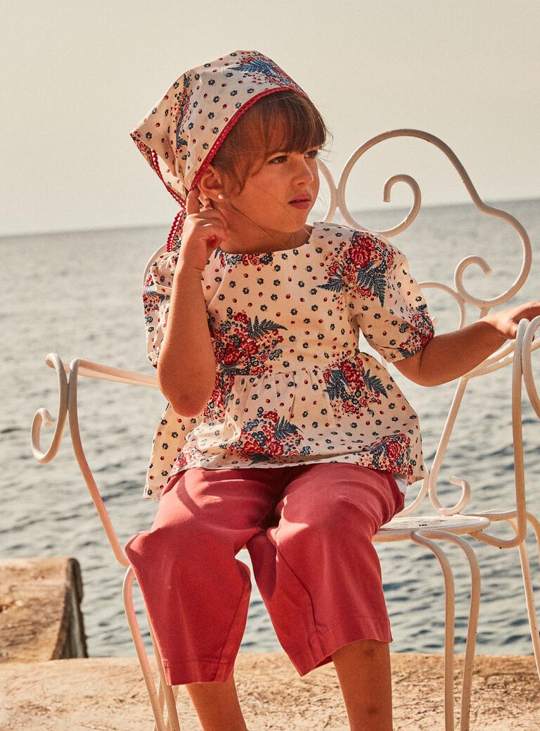 Blouse écrue à lanières croisées au dos