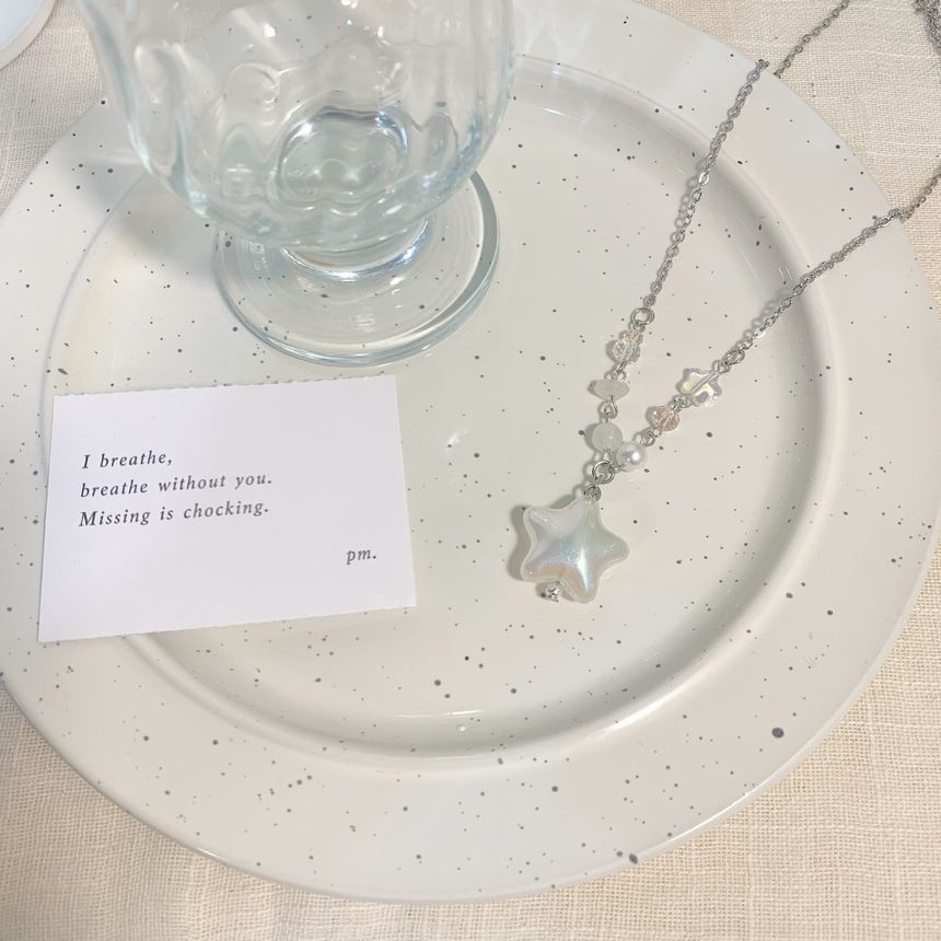 Sharkkira - Sterhanger kralenketting