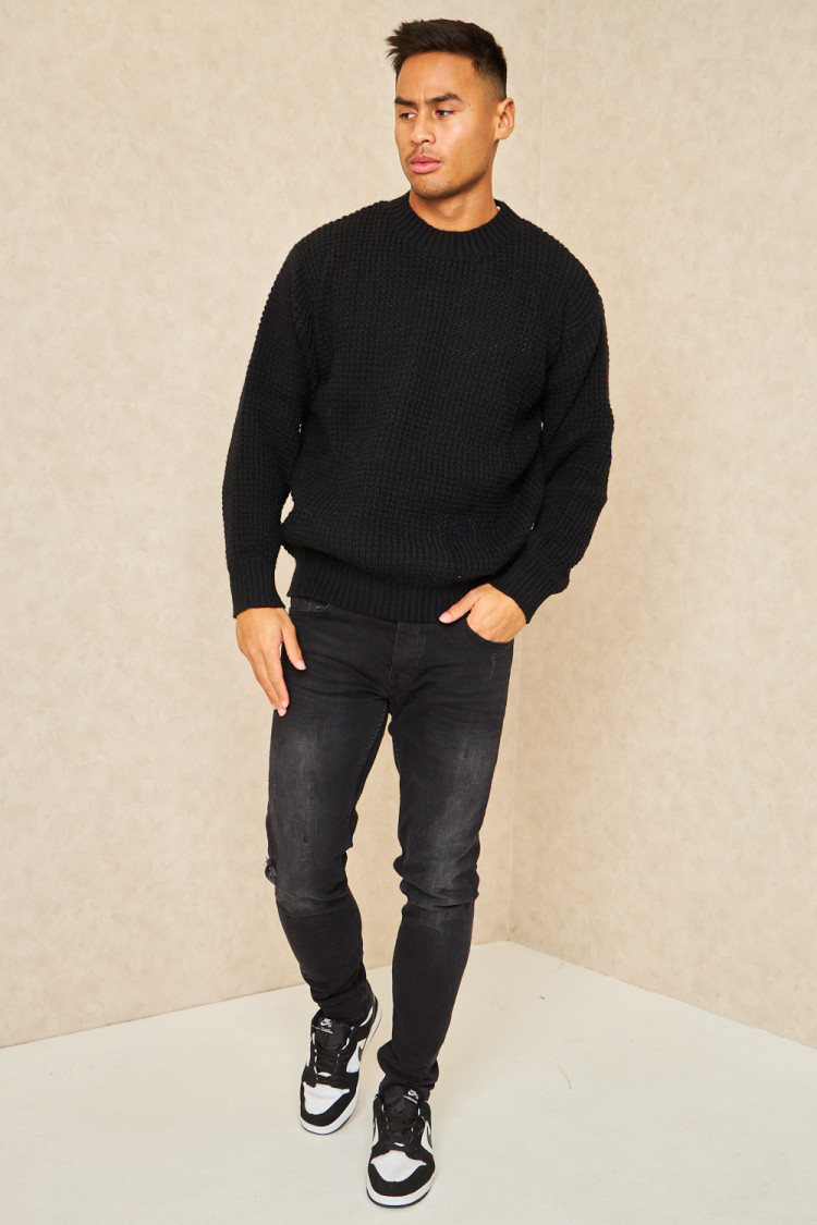 Pull noir col rond aspect crochet