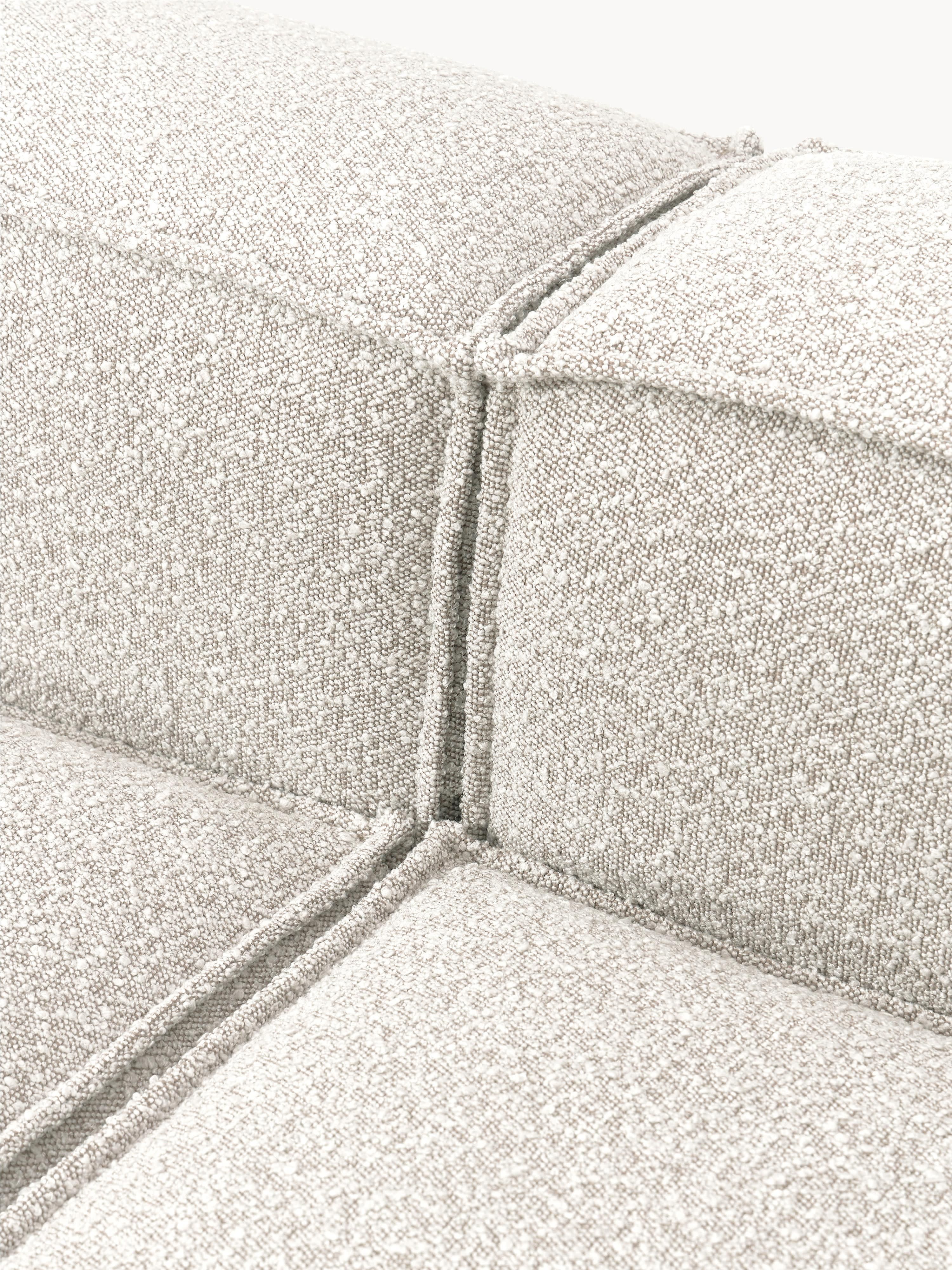 Modulaire bank Lennon (4-zits) uit bouclé met poef (links/rechts)