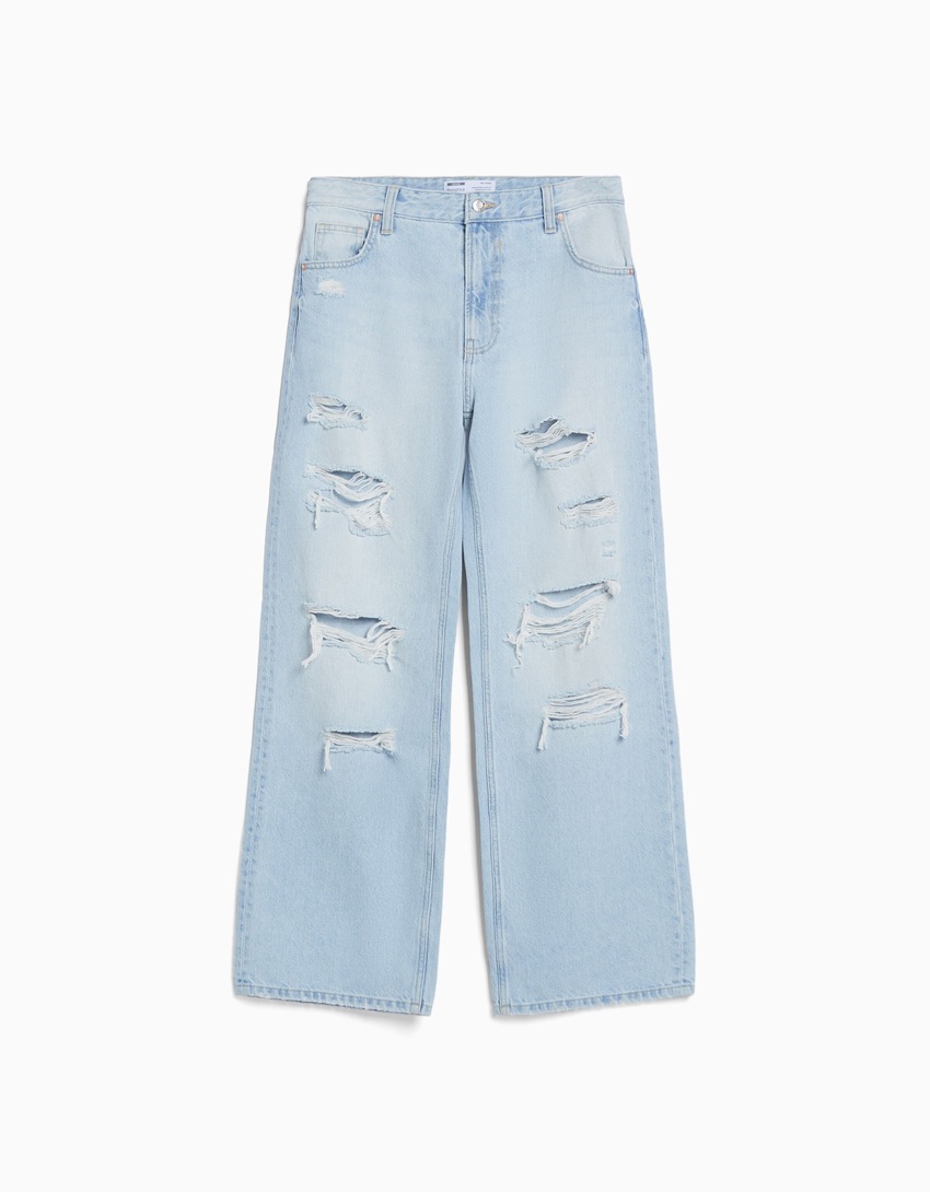 Calça jeans rasgada de perna larga dos anos 90