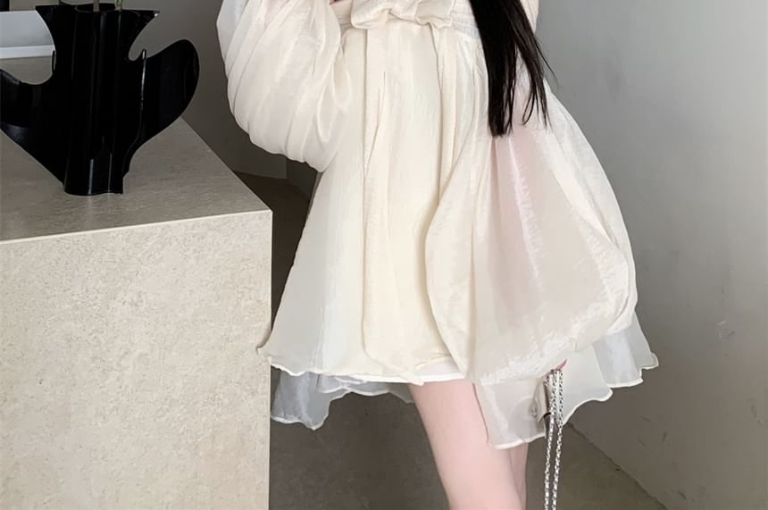 Odestra - Lange mouw off-shoulder effen mini A-lijn jurk