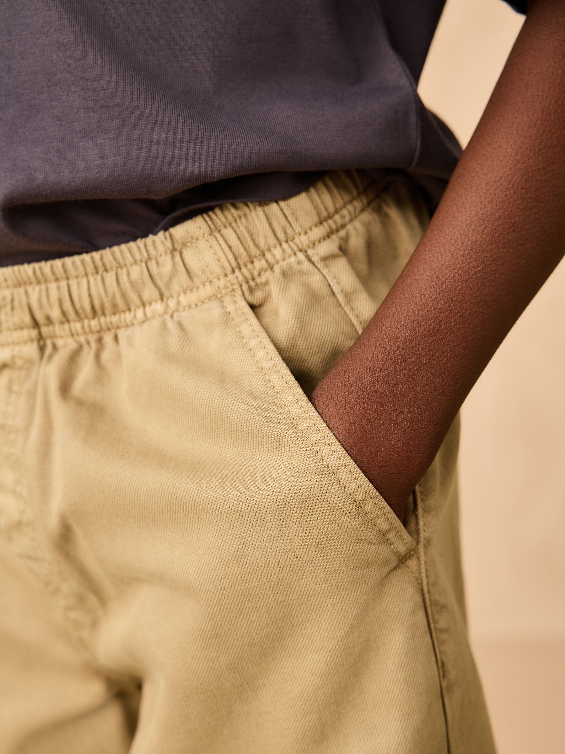 Pastelgeel - Twill jeans met aantrekkoord (3-16jr)