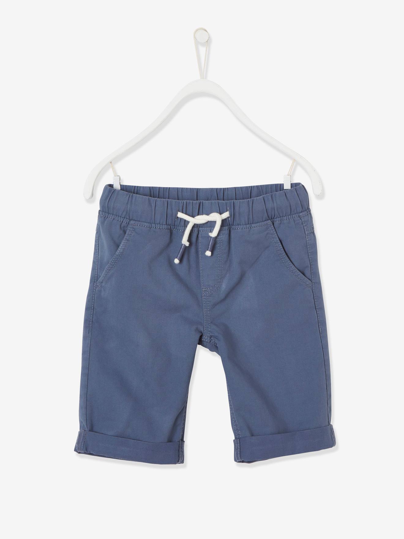 Bermuda infantil colorida na cor laranja médio com estampas lisas.
