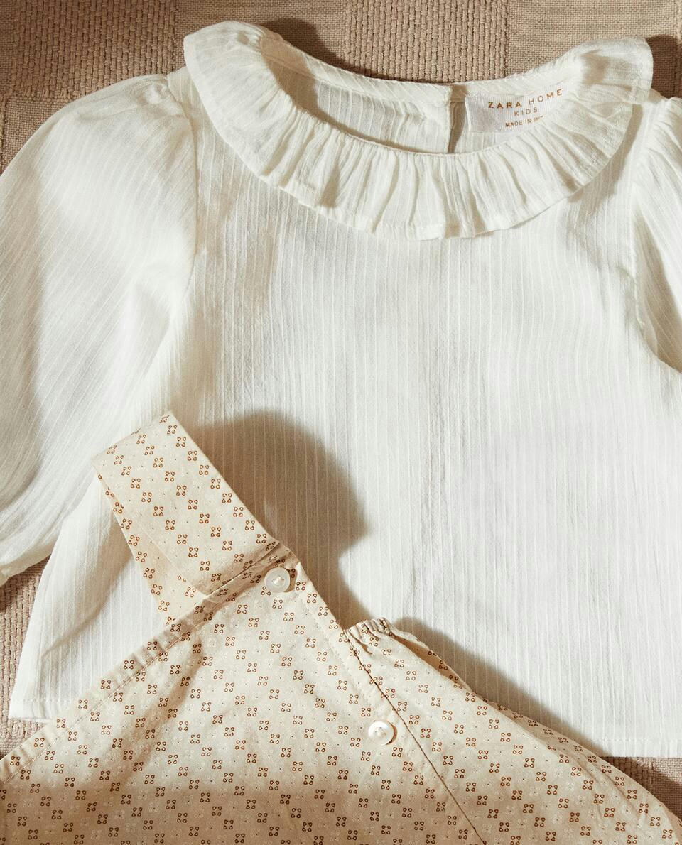 CAMISETA DE BEBÊ COM BABADO