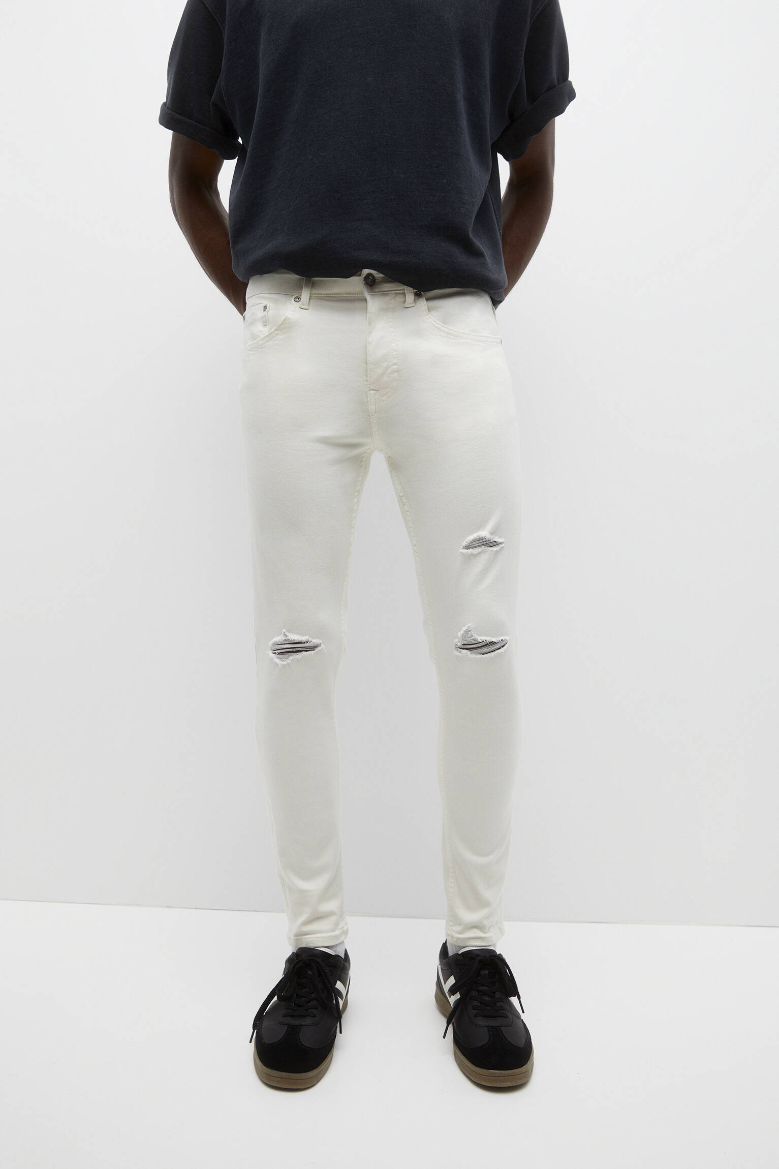 CALÇA JEANS SUPER SKINNY RASGADA - BRANCA