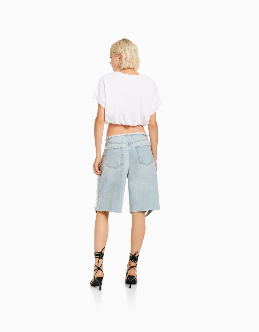 Bermuda jeans rasgada