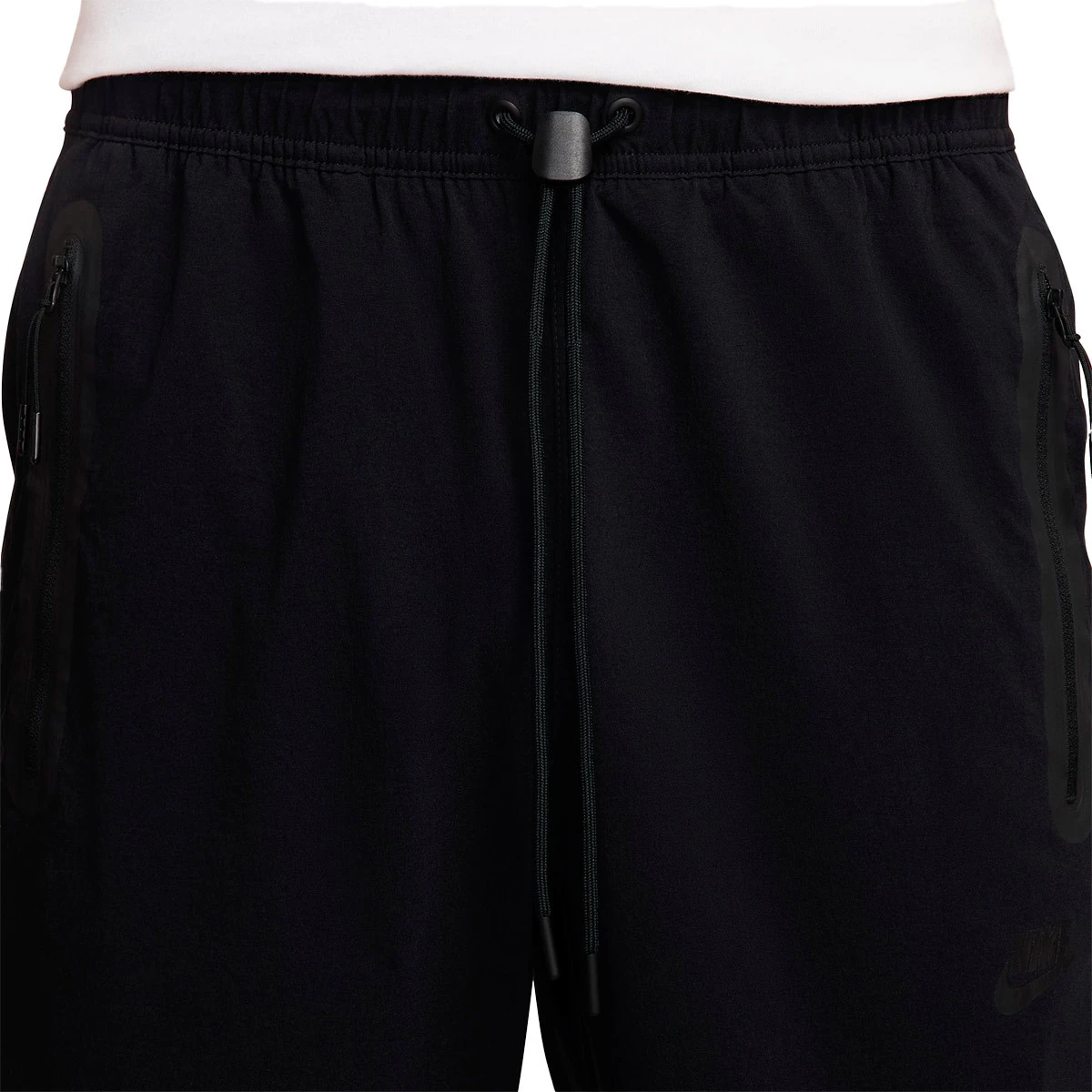 Calças Nike Tech Woven