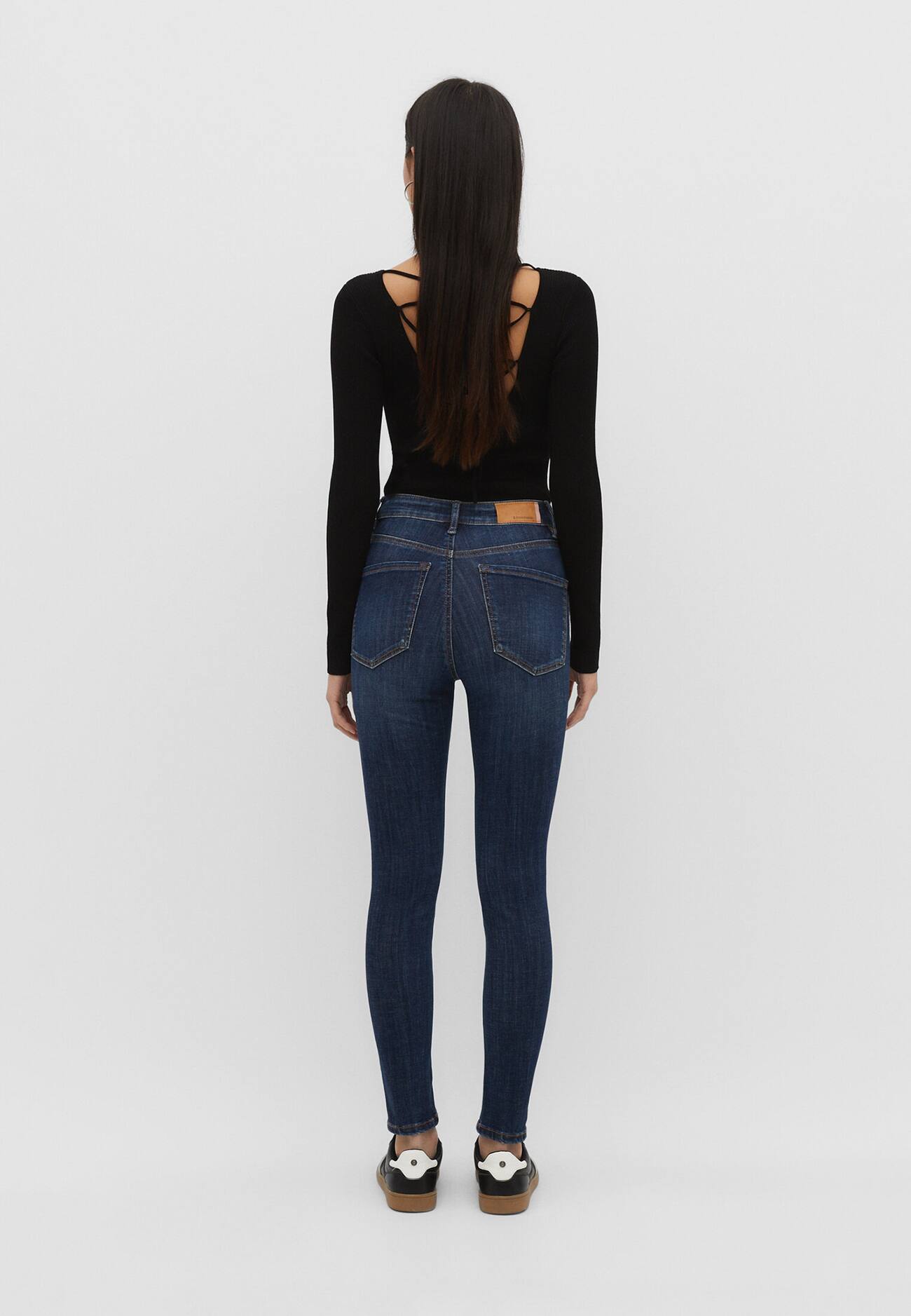 Calça jeans skinny de cintura regular, tamanho 1400.