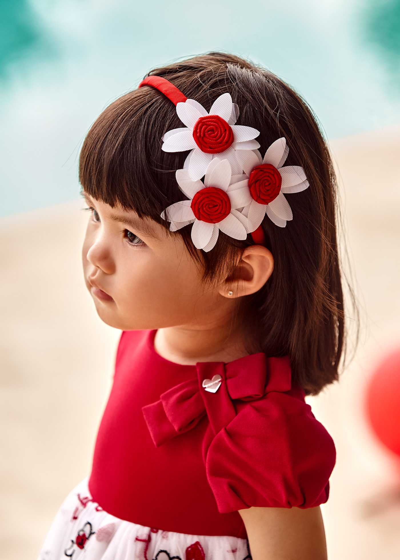 Faixa de cabelo para bebê com aplique floral