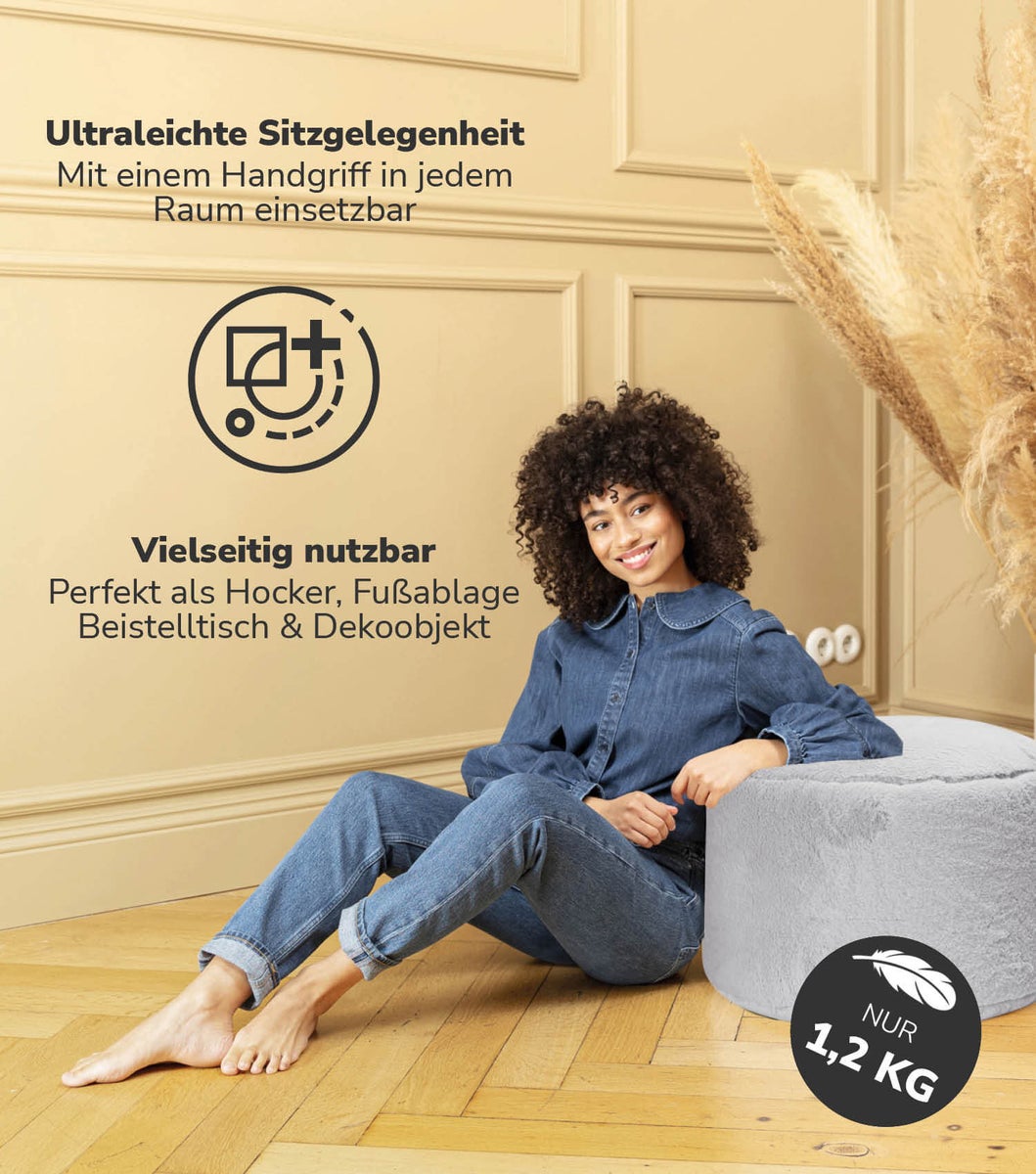 mokebo imitatiebont poef 'The Fluffy One', voetenbankje of zitpoef in grijs