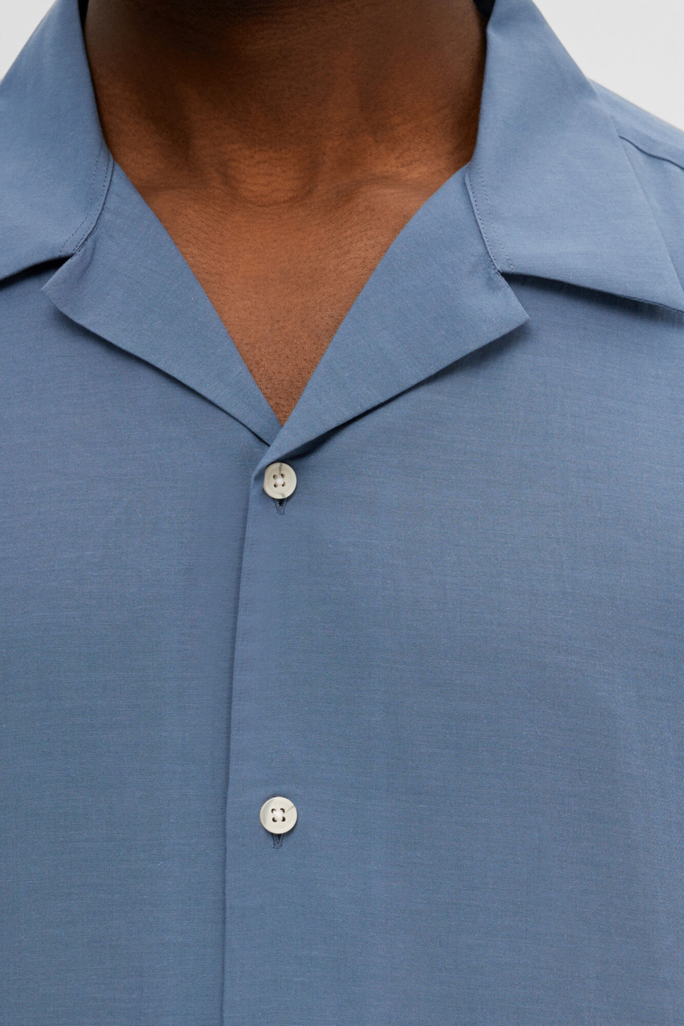 Camisa de manga curta em tencel e algodão orgânico. - Azul