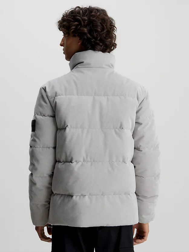 Jaqueta oversized de veludo cotelê com enchimento de plumas