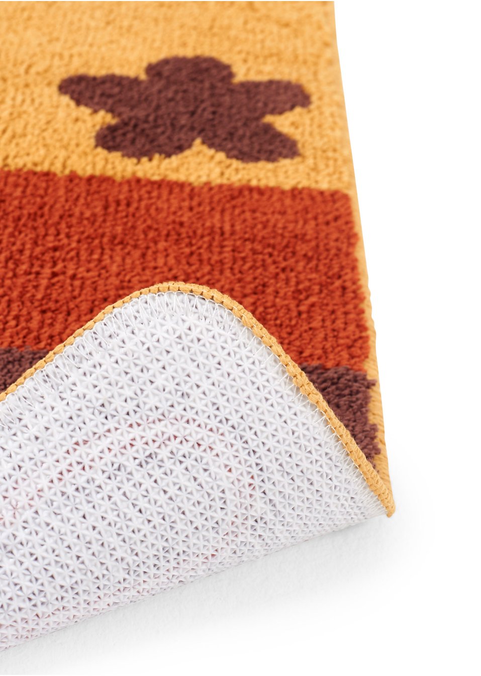 Tapis de salle de bain tufté en tons chauds