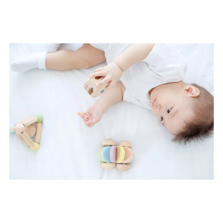 Plan Toys Hochet cache-cache pastel