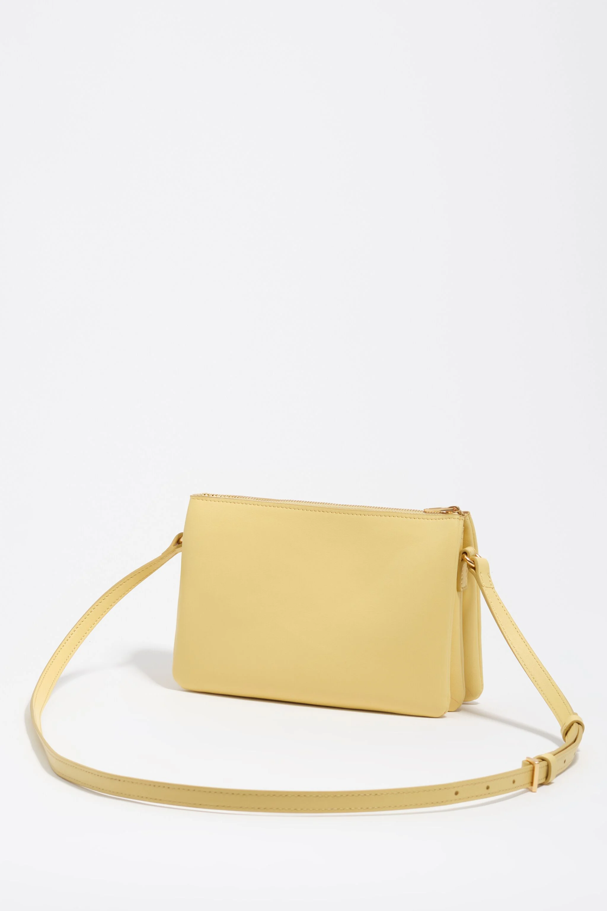 Bolsa clutch tripla mini banana em couro