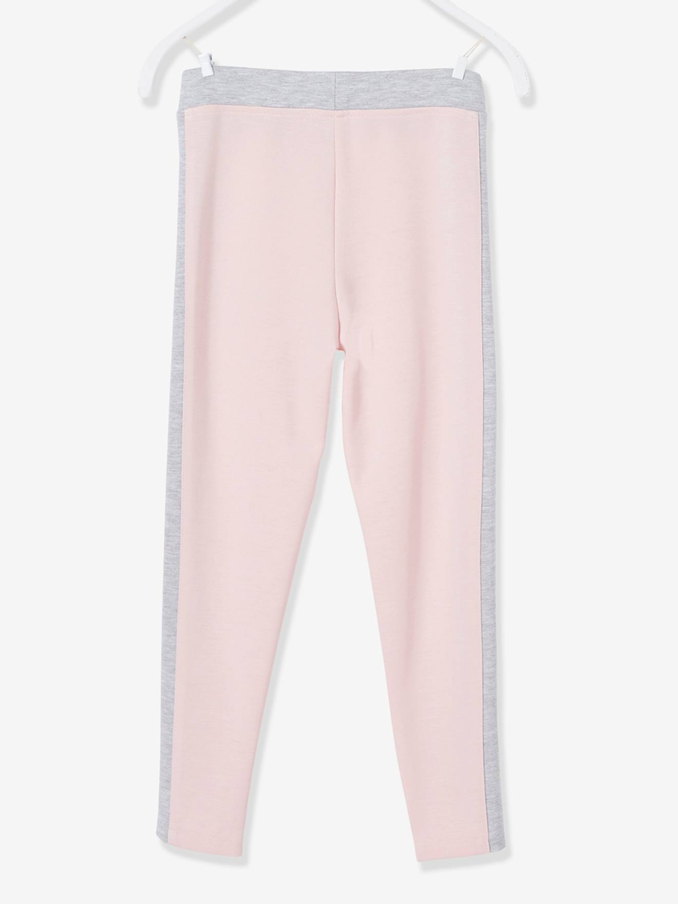 Leggings esportivas lisas rosa claro para meninas com listras laterais.