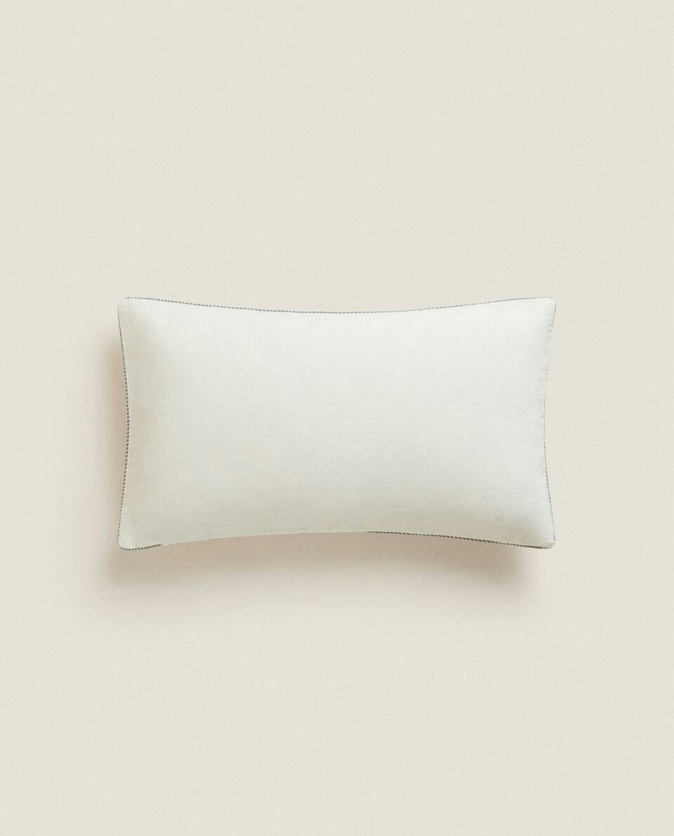 CAPA DE ALMOFADA COM COSTURA DETALHADA