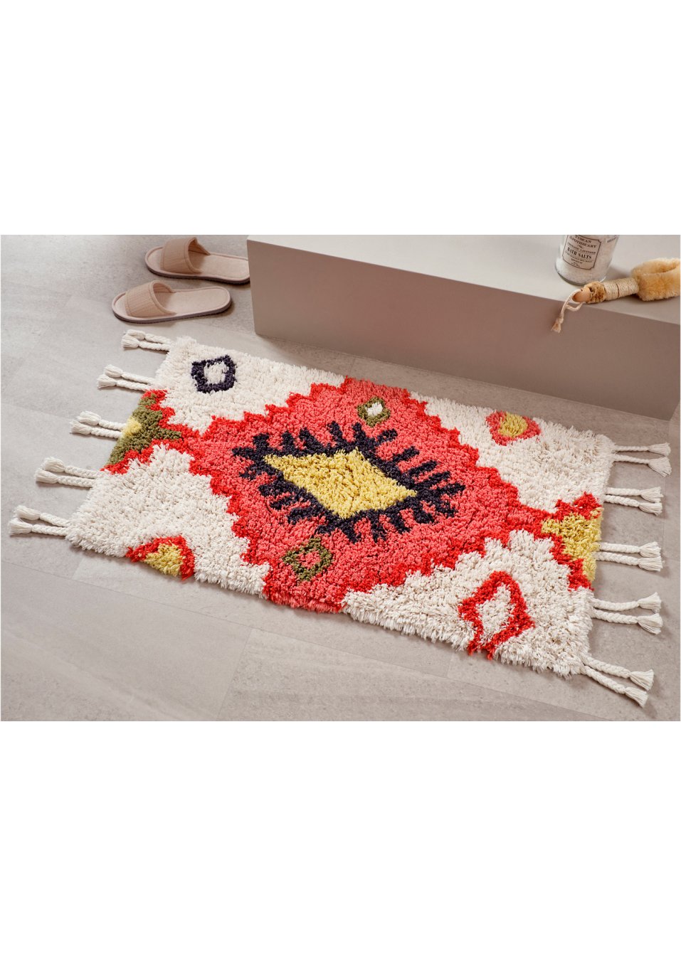 Tapis de salle de bain avec houppes