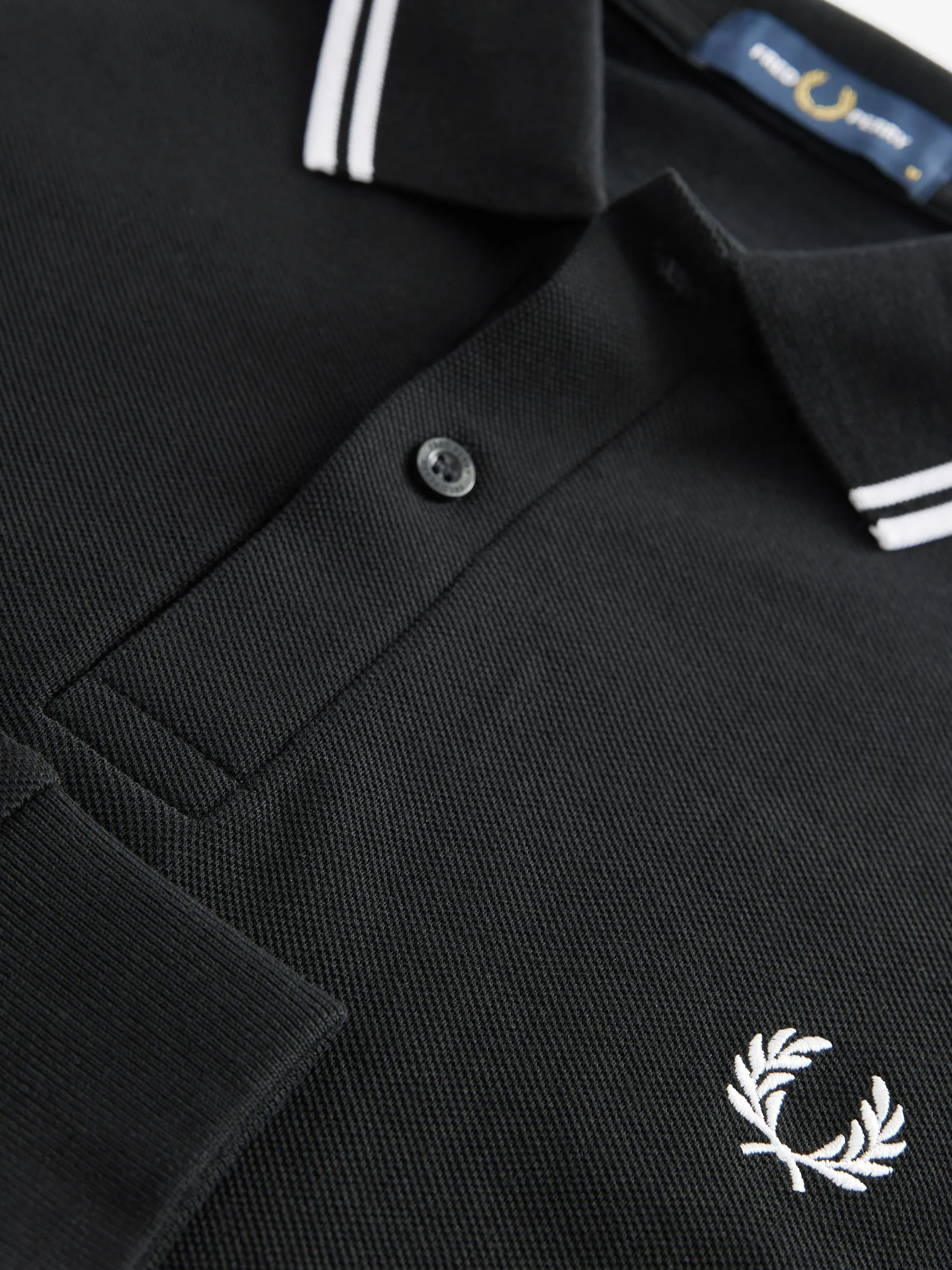 Zwart/wit - Fred Perry poloshirt met tweekleurige streep op de mouw