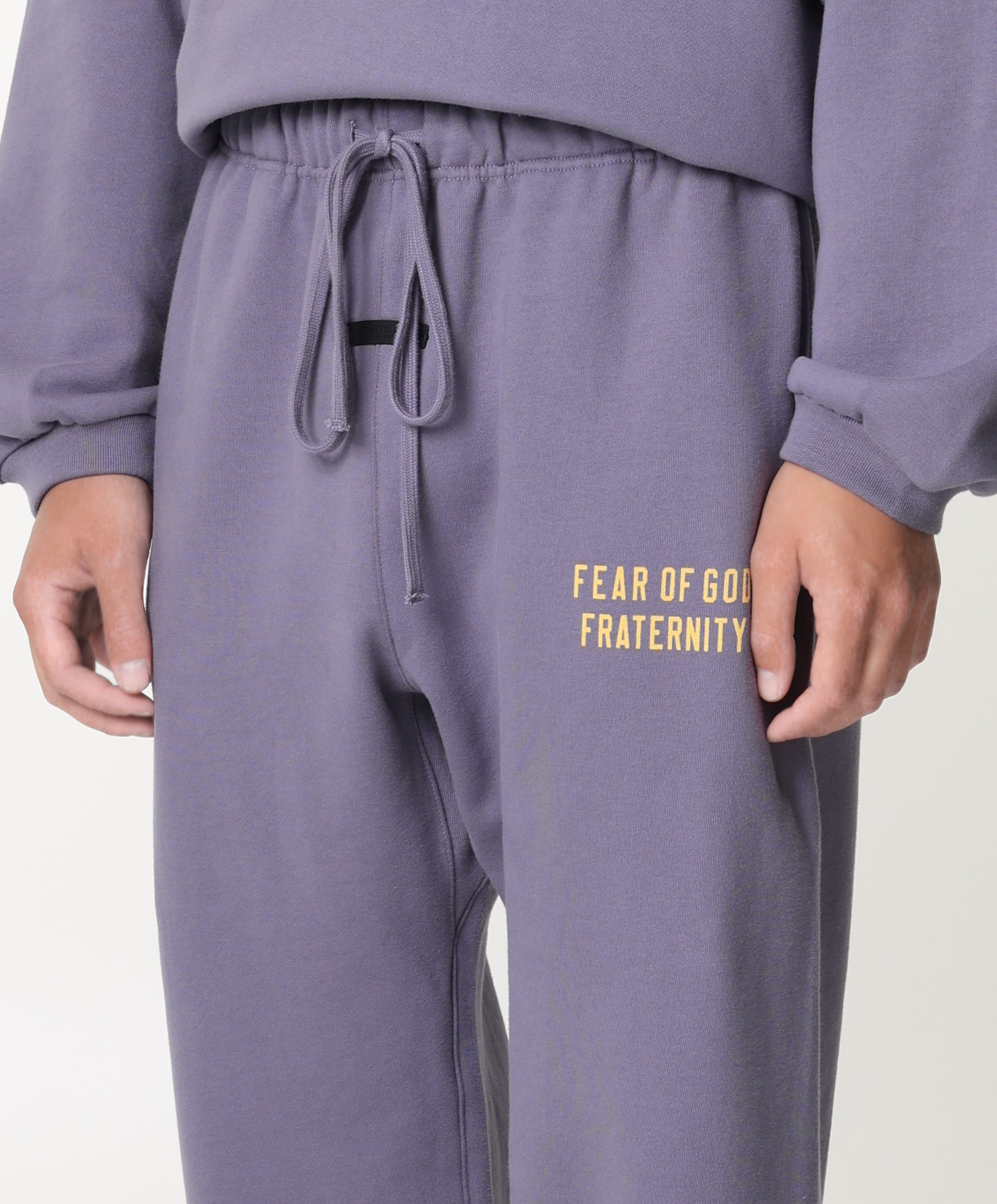 Fear of God Essentials heren broek paars